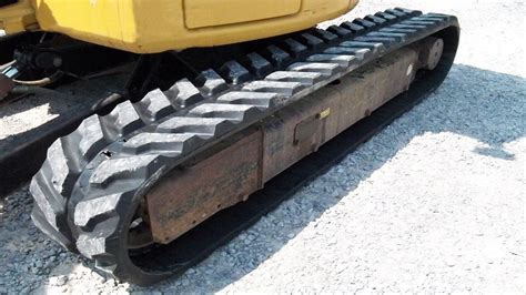 how to get rubber track back on mini excavator|aftermarket rubber tracks.